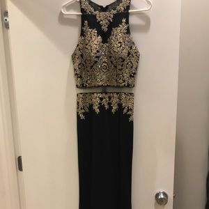Regiss brand black and gold prom dress